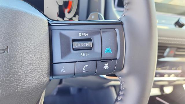 Photo of 2025 Deep Ocean Blue Pearl/Super Black Nissan Rogue