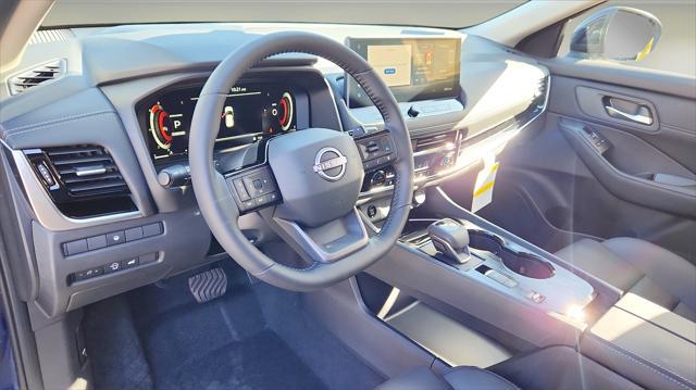 Photo of 2025 Deep Ocean Blue Pearl/Super Black Nissan Rogue