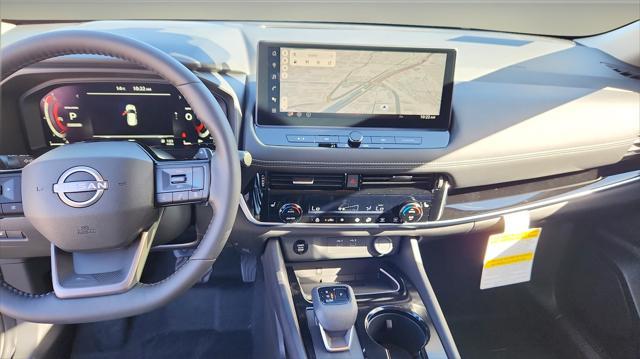 Photo of 2025 Deep Ocean Blue Pearl/Super Black Nissan Rogue