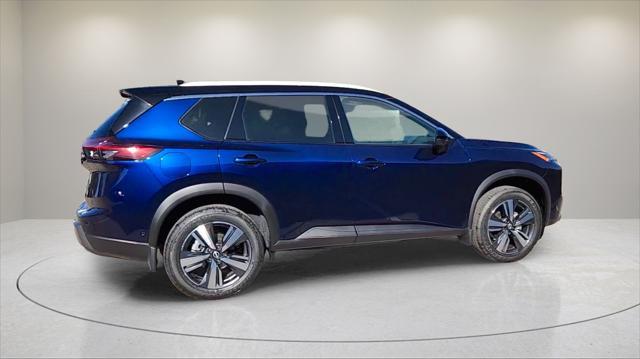 Photo of 2025 Deep Ocean Blue Pearl/Super Black Nissan Rogue