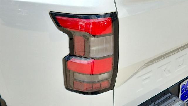 Photo of 2024 Glacier White Nissan Frontier