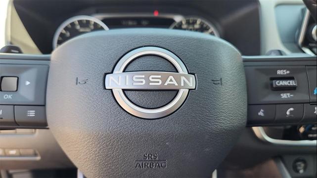 Photo of 2025 Scarlet Ember Tintcoat Nissan Rogue