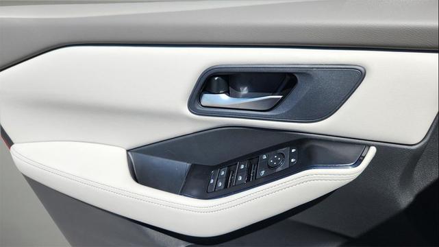 Photo of 2025 Scarlet Ember Tintcoat Nissan Rogue