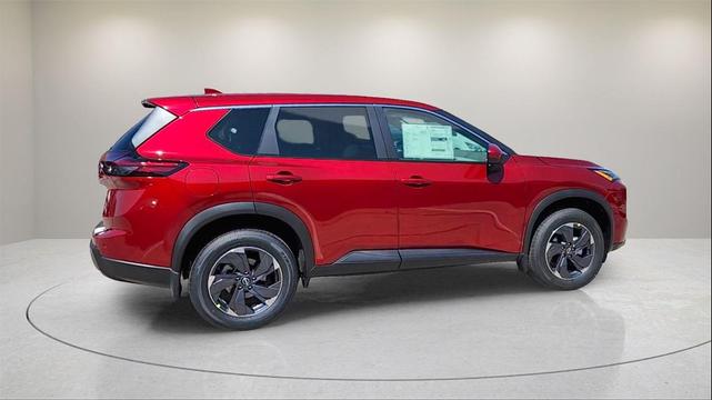 Photo of 2025 Scarlet Ember Tintcoat Nissan Rogue