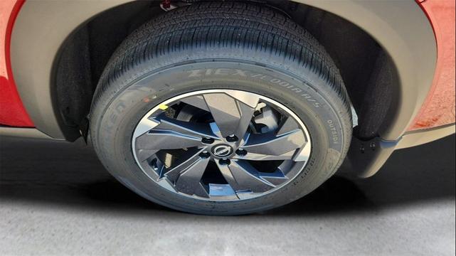 Photo of 2025 Scarlet Ember Tintcoat Nissan Rogue