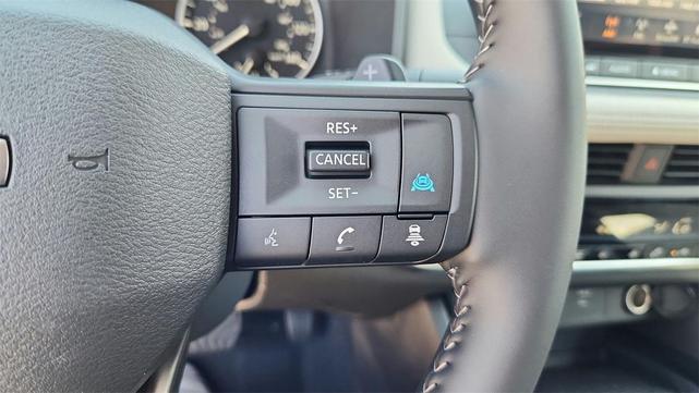 Photo of 2025 Scarlet Ember Tintcoat Nissan Rogue