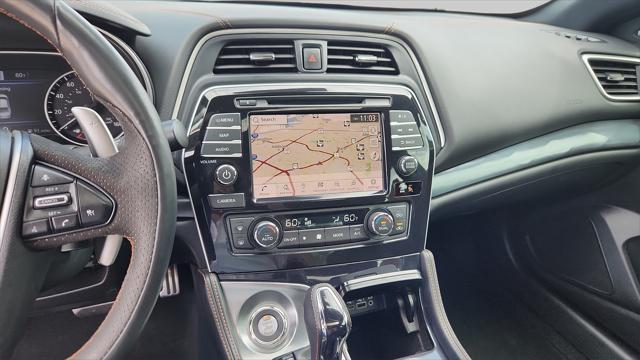 Photo of 2023 Pearl White Tricoat Nissan Maxima