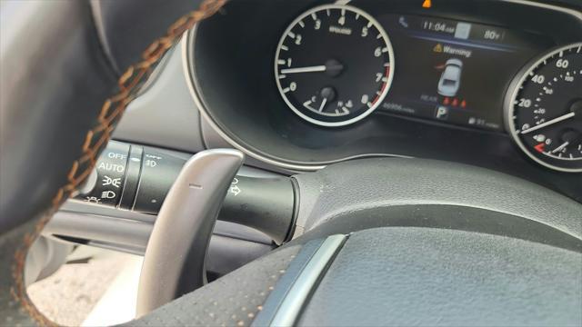 Photo of 2023 Pearl White Tricoat Nissan Maxima