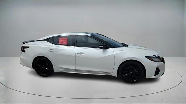 Photo of 2023 Pearl White Tricoat Nissan Maxima