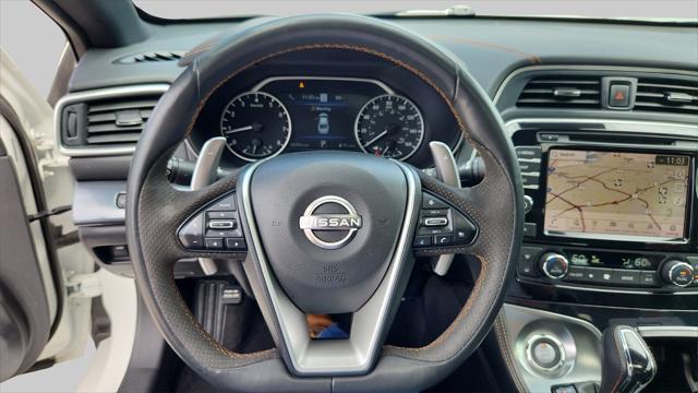 Photo of 2023 Pearl White Tricoat Nissan Maxima