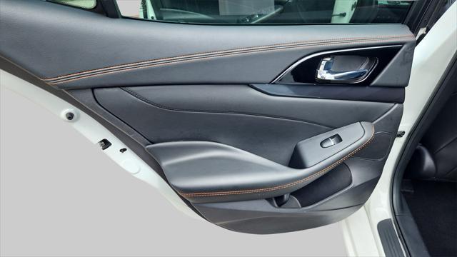Photo of 2023 Pearl White Tricoat Nissan Maxima