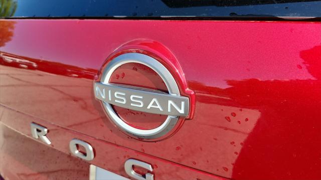Photo of 2025 Scarlet Ember Tintcoat Nissan Rogue