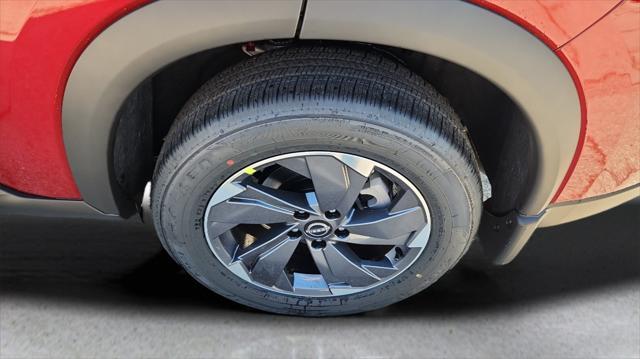 Photo of 2025 Scarlet Ember Tintcoat Nissan Rogue