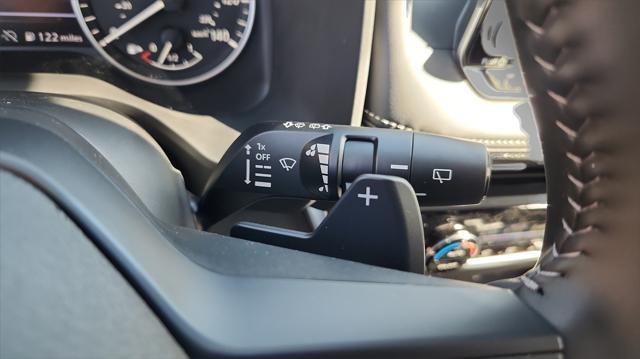 Photo of 2025 Scarlet Ember Tintcoat Nissan Rogue