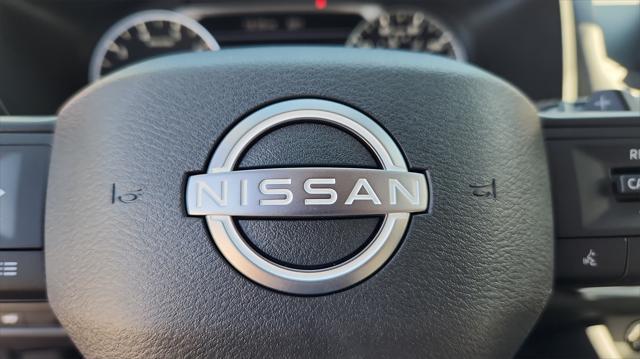 Photo of 2025 Scarlet Ember Tintcoat Nissan Rogue
