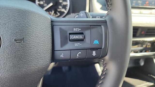 Photo of 2025 Scarlet Ember Tintcoat Nissan Rogue