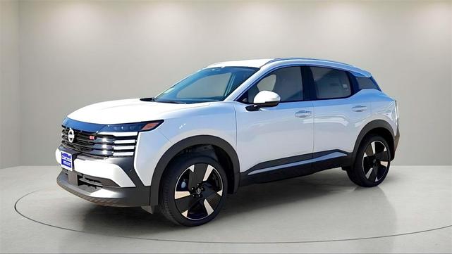 Photo of 2025 Aspen White Tricoat Nissan Kicks