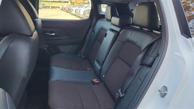 Photo of 2025 Aspen White Tricoat Nissan Kicks