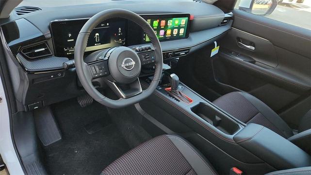 Photo of 2025 Aspen White Tricoat Nissan Kicks