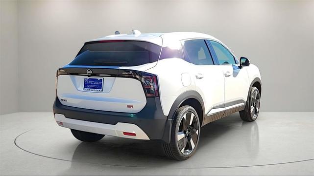 Photo of 2025 Aspen White Tricoat Nissan Kicks