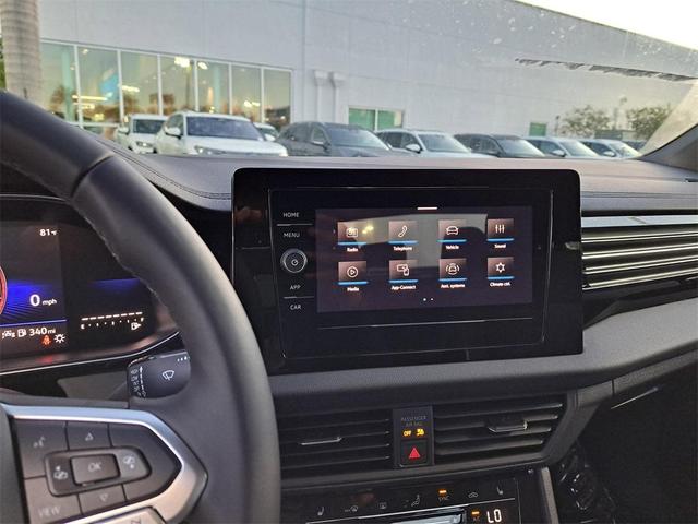 Photo of 2025 Kings Red Metallic Volkswagen Jetta