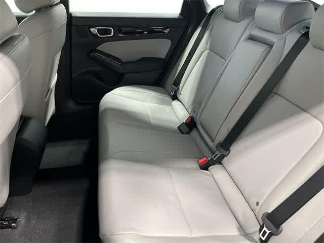 Photo of 2026 Boost Blue Pearl Honda Civic Hybrid