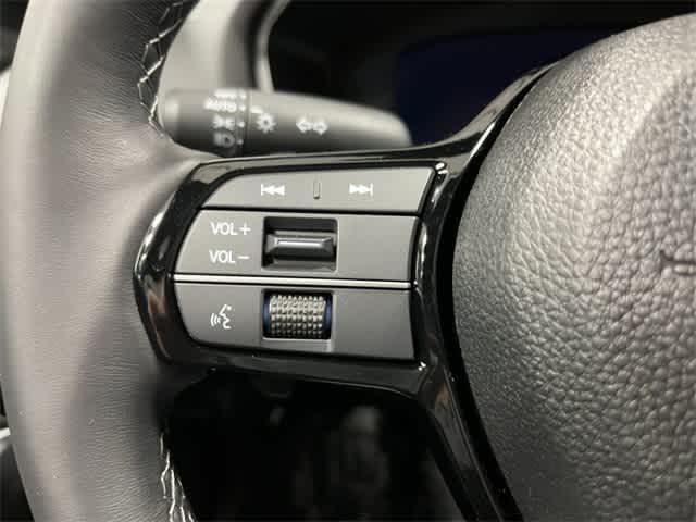 Photo of 2026 Boost Blue Pearl Honda Civic Hybrid