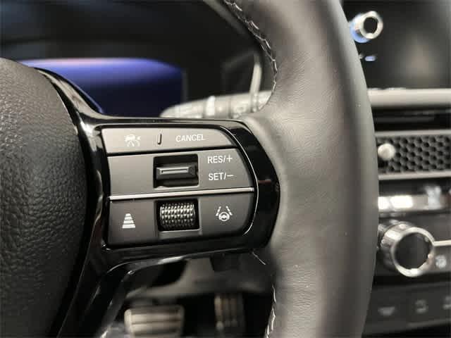 Photo of 2026 Boost Blue Pearl Honda Civic Hybrid