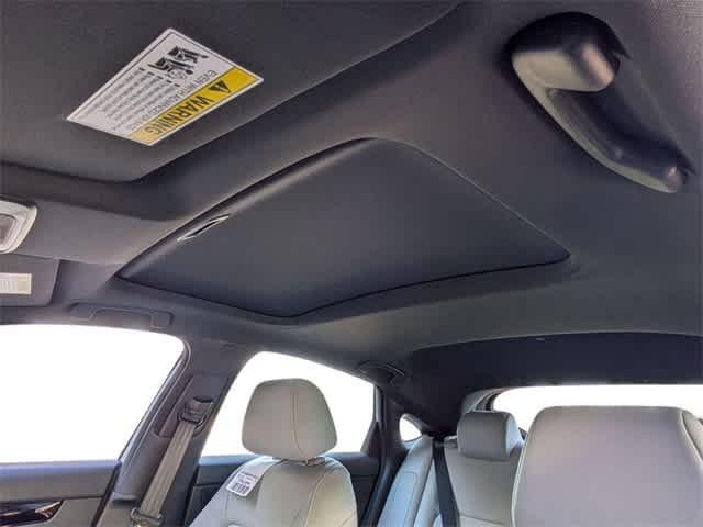 Photo of 2025 Boost Blue Pearl Honda Civic Hybrid