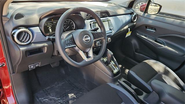 Photo of 2025 Scarlet Ember Tintcoat Nissan Versa