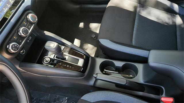 Photo of 2025 Scarlet Ember Tintcoat Nissan Versa