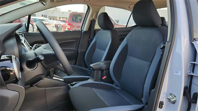 Photo of 2025 Aspen White Tricoat Nissan Versa