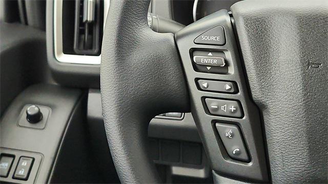 Photo of 2025 Glacier White Nissan Frontier