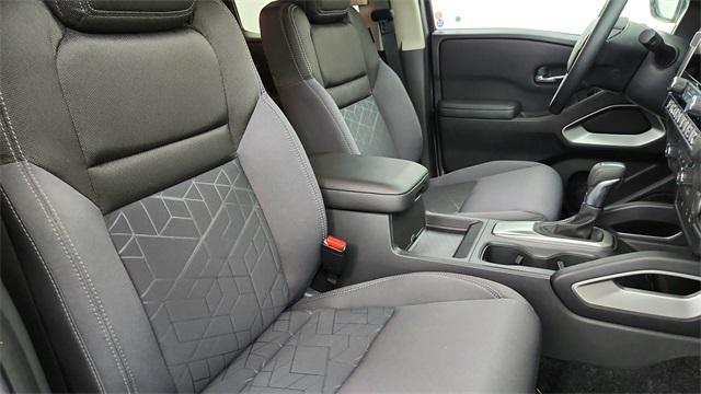 Photo of 2025 Glacier White Nissan Frontier