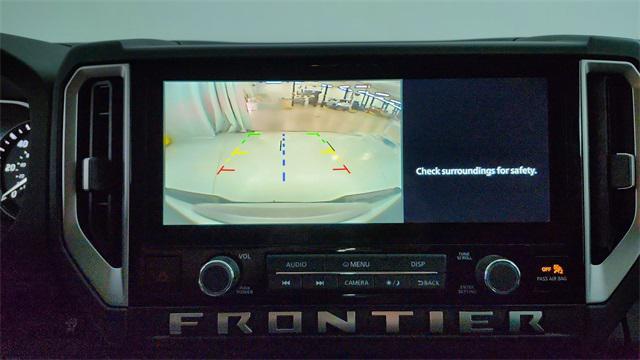 Photo of 2025 Glacier White Nissan Frontier
