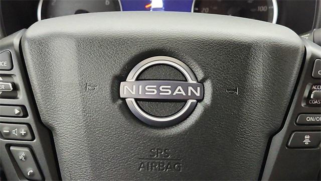 Photo of 2025 Glacier White Nissan Frontier