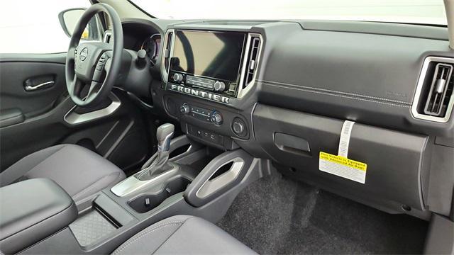 Photo of 2025 Glacier White Nissan Frontier