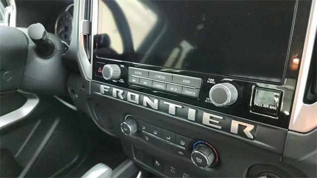 Photo of 2025 Glacier White Nissan Frontier