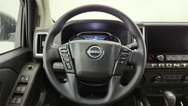 Photo of 2025 Glacier White Nissan Frontier