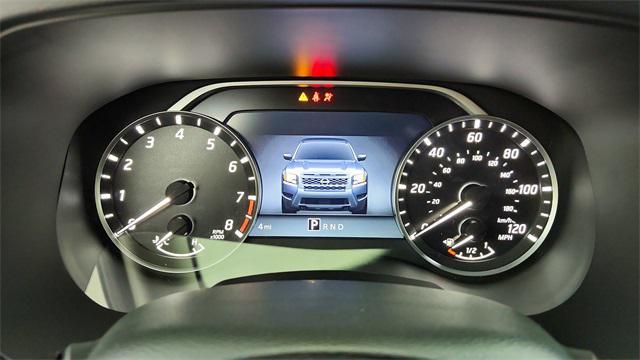Photo of 2025 Glacier White Nissan Frontier