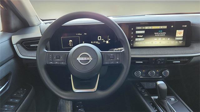 Photo of 2025 Scarlet Ember Tintcoat Nissan Kicks