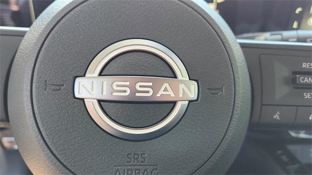 Photo of 2025 Scarlet Ember Tintcoat Nissan Kicks