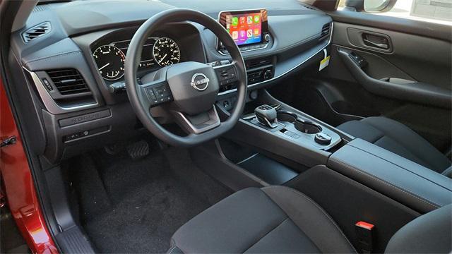 Photo of 2026 Scarlet Ember Tintcoat Nissan Rogue