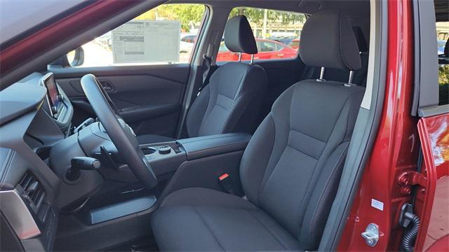 Photo of 2026 Scarlet Ember Tintcoat Nissan Rogue