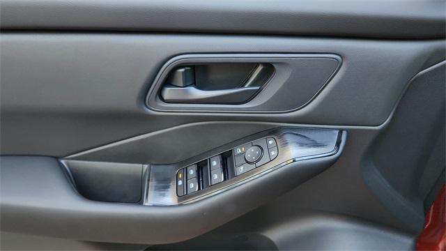 Photo of 2026 Scarlet Ember Tintcoat Nissan Rogue
