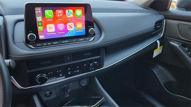 Photo of 2026 Scarlet Ember Tintcoat Nissan Rogue