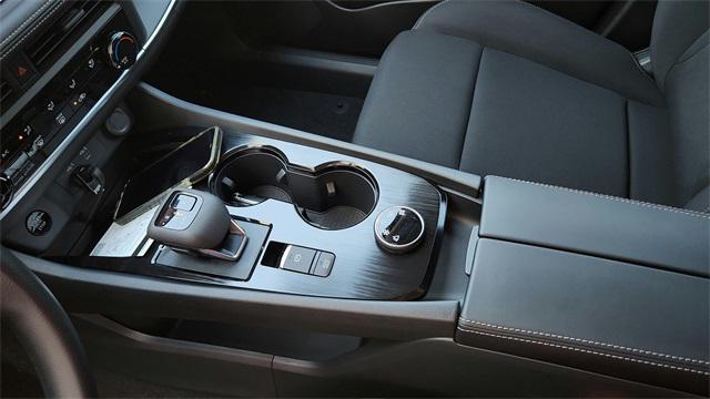 Photo of 2026 Scarlet Ember Tintcoat Nissan Rogue