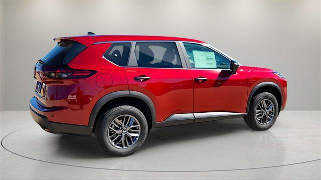 Photo of 2026 Scarlet Ember Tintcoat Nissan Rogue