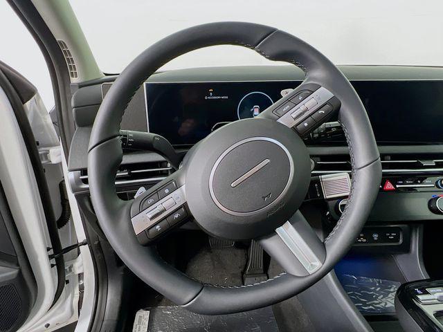 Photo of 2025 Creamy White Pearl Hyundai TUCSON Hybrid