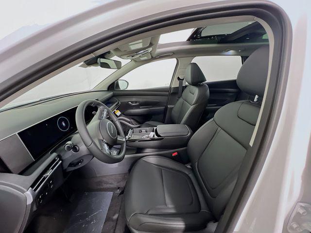 Photo of 2025 Creamy White Pearl Hyundai TUCSON Hybrid